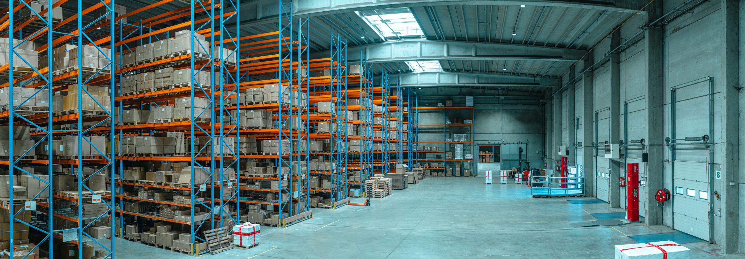 global supply chain shelves with packages in warehouse